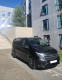 A picture of this transfer company's vehicle